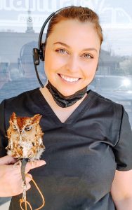 Owl on woman's finger