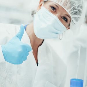 A woman giving a thumbs up