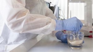 Compounding pharmacy worker